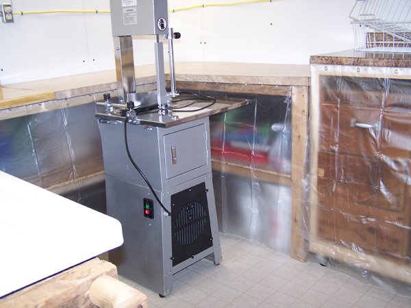9.Butcher Shop - Bandsaw and under counter storage1 crop Dec. 08.jpg