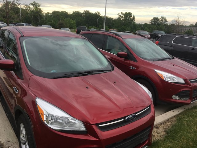 Ford Escape old and twin.JPG