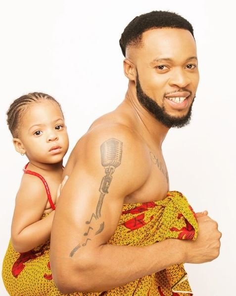 Famous-Singer--Flavour-Ties-Daughter-To-His-Back-In-Cute-Photo-To-Celebrate-Her-Birthday127643012070675563.jpg
