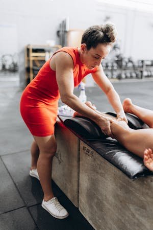 free-photo-of-a-woman-in-red-is-doing-a-massage-on-a-man.jpeg