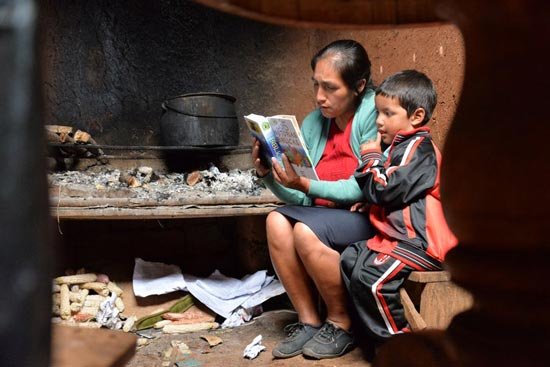 mom-reading-bible-to-child-poverty.jpg