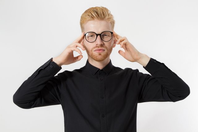 vecteezy_young-man-in-thinking-process-close-up-redheaded-guy-with__338.jpg