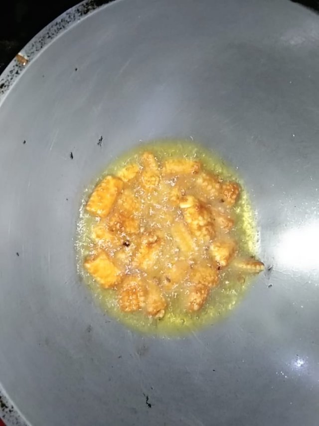 frying corns.jpeg