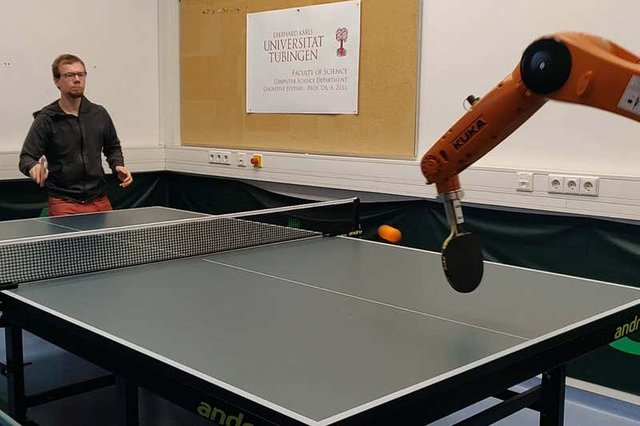 Robot playing tennis picture.jpg