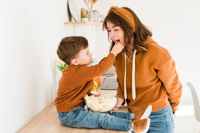 little-boy-feeding-his-mom.jpg