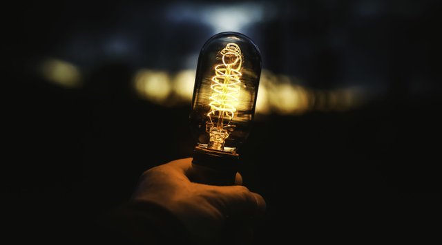 closeup-shot-human-hand-holding-lamp (1).jpg