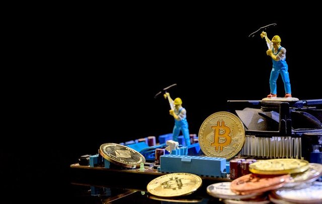 bitcoin-crypto-currency-with-gold-money-miniature-toy-new-virtual-technology-business-block-chain_42957-10344.jpg