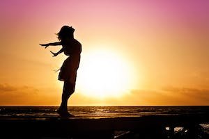 woman-happiness-sunrise-silhouette-40192.jpeg