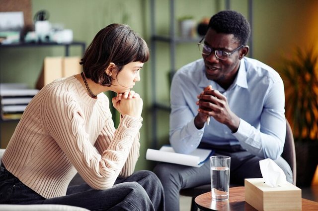 pensive-young-woman-listening-psychotherapist-explaining-how-recover-from-traumatizing-experience_236854-38938.jpg