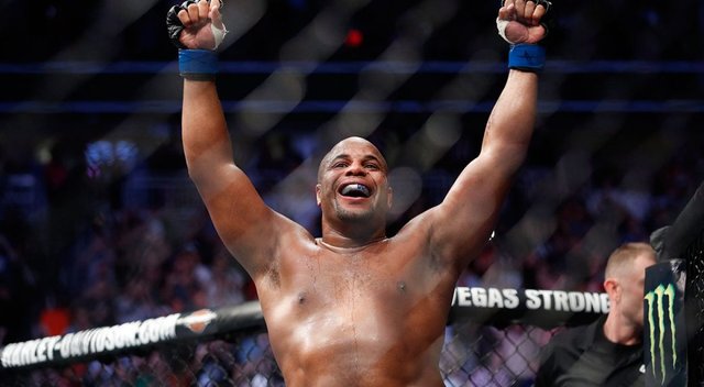 daniel-cormier-celebrates-ufc-226-win-over-stipe-miocic-1040x572.jpg