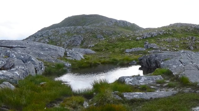 14 Summit bump of Stob Coire Sgriodain with tiny pool.jpg