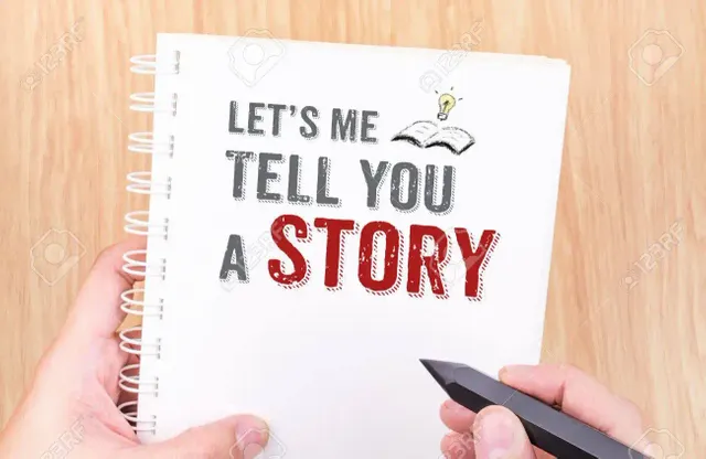 53774952-let-s-me-tell-you-a-story-work-on-white-ring-binder-notebook-with-hand-holding-pencil-on-wood-table-.jpg