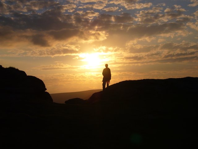 Someone_at_Haytor_at_sunset.jpg