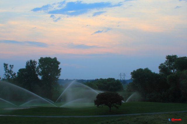 sunrise dawn clouds colorful sprinklers golf course SR0008.JPG