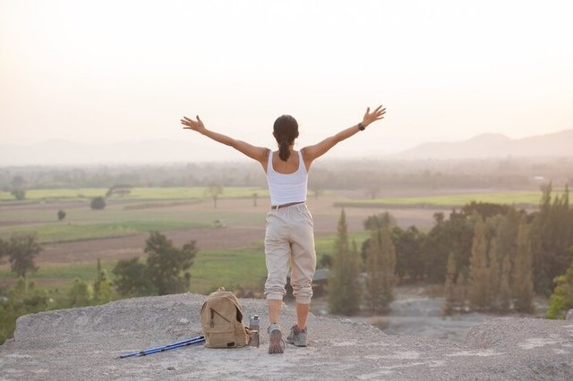 woman-raising-hands-up-top-mount.jpg