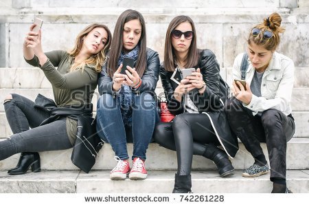 stock-photo-group-of-girls-with-smart-phones-technology-cell-phone-isolation-and-emotional-depression-742261228.jpg