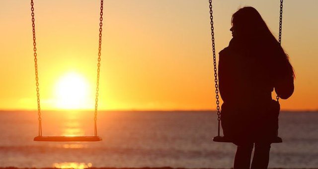 hipwee-woman-on-swings-sunset-750x400.jpg