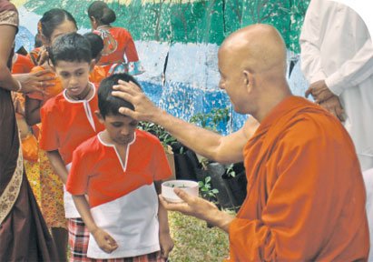 Anointing-Oil-New-Year-Sri-Lanka.jpg