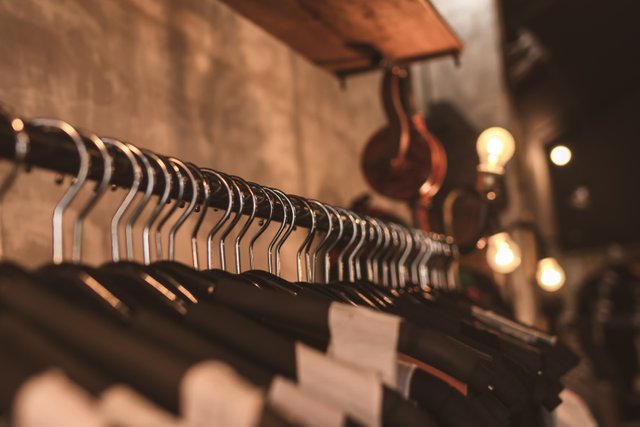 photo-of-black-clothes-on-hangers-1036856.jpg