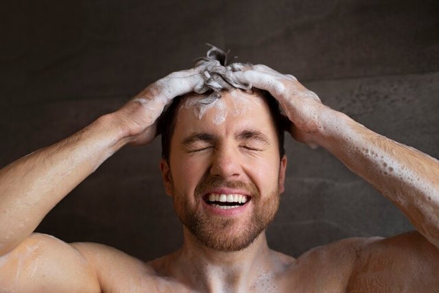 front-view-man-washing-hair_23-2150323135.jpg