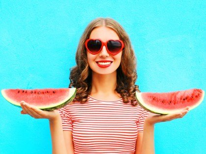 smiling-woman-holding-watermelon-732x549-thumb.jpg