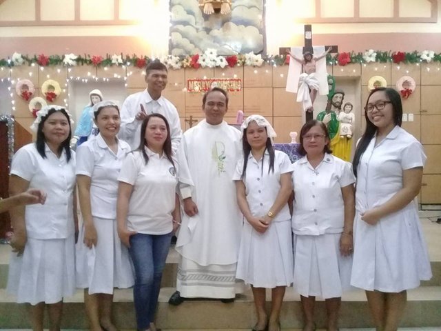 me, our priest and my co-leccom.jpg