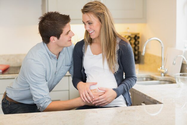 young-happy-pregnant-woman-with-husband_13339-119857.jpg