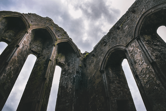 crimsonclad irish stone wall ruins