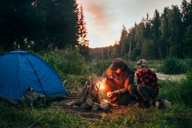 father-and-son-camping-together-picture-id833226490.jpg