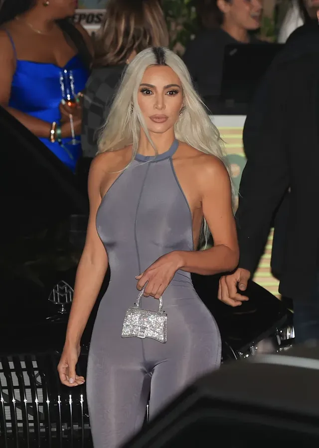 kim-kardashian-silver-catsuit-818-tequila-party (1).webp