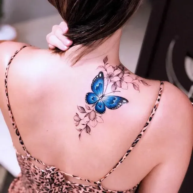 Blue-butterfly-on-the-shoulder.webp