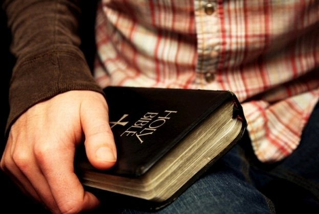 man_holding_bible-a4.jpg