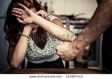 stock-photo-woman-covering-her-face-in-fear-of-domestic-violence-151887443.jpg