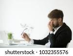 stock-photo-eyes-fatigue-at-work-tired-exhausted-businessman-suffering-from-computer-vision-syndrome-taking-1032355576.jpg