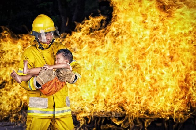 firefighter-rescue-fireman-save-child-fire-incident-109982543.jpg