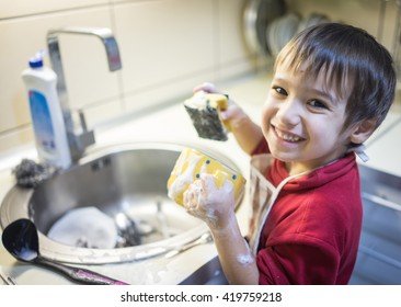 little-cute-boy-washing-dishes-260nw-419759218.jpg