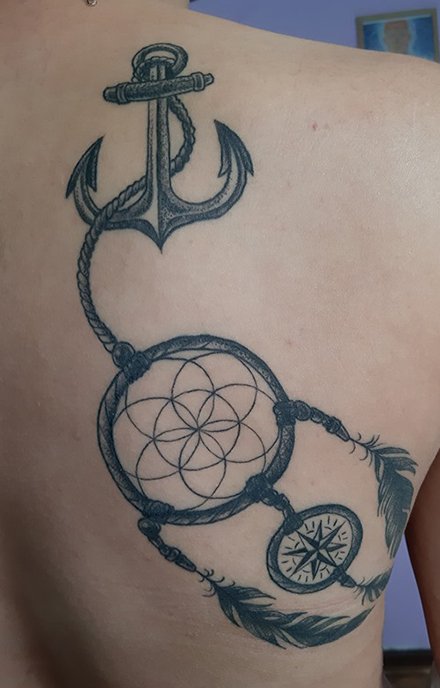 compass dreamcatcher tattoo