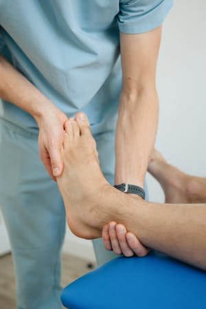 free-photo-of-physiotherapist-massaging-foot.jpeg