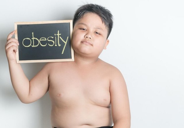 portrait-shirtless-boy-holding-blackboard-with-text-against-wall_1048944-24149861.jpg