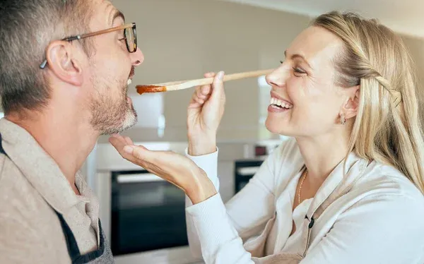 depositphotos_610045088-stock-photo-cooking-woman-feed-man-taste.jpg