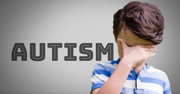 boy-against-grey-background-with-autism-text_1134-15514.jpg