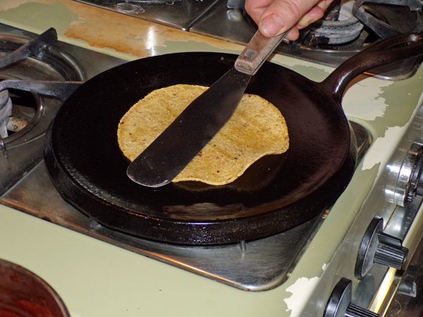 Enchiladas - heating corn tortillas crop January 2020.jpg