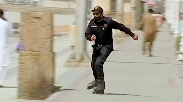 https___cdn.cnn.com_cnnnext_dam_assets_210223205529-rollerblading-cops.jpg