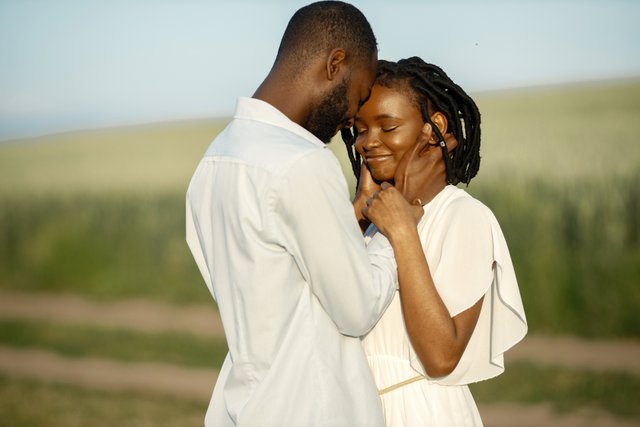 happy-romantic-couple-hugging-summer-field.jpg