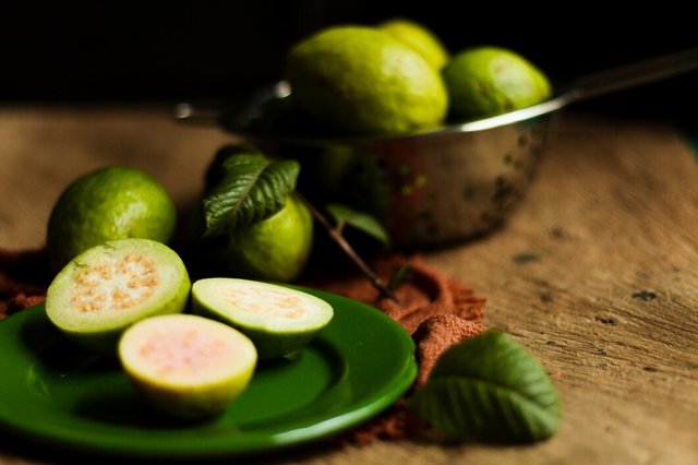 close-up-guava-fruits-plate_23-2148352309.jpg