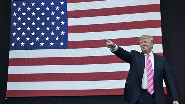 Trump with flag.jpg
