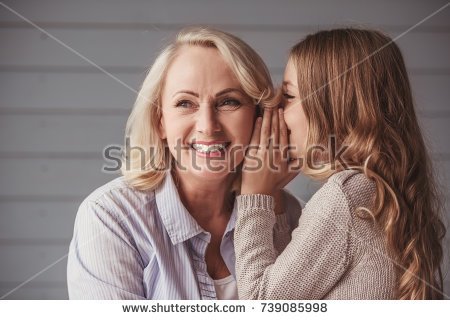 stock-photo-beautiful-granny-is-smiling-while-teenage-granddaughter-is-whispering-her-something-739085998.jpg