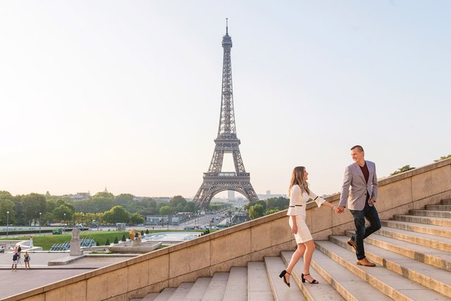 Proposal-photographer-in-Paris-Christian-Perona-sunrise-Trocadero-Eiffel-tower-she-said-yes-wedding-couple-stairs-dress-2.jpg