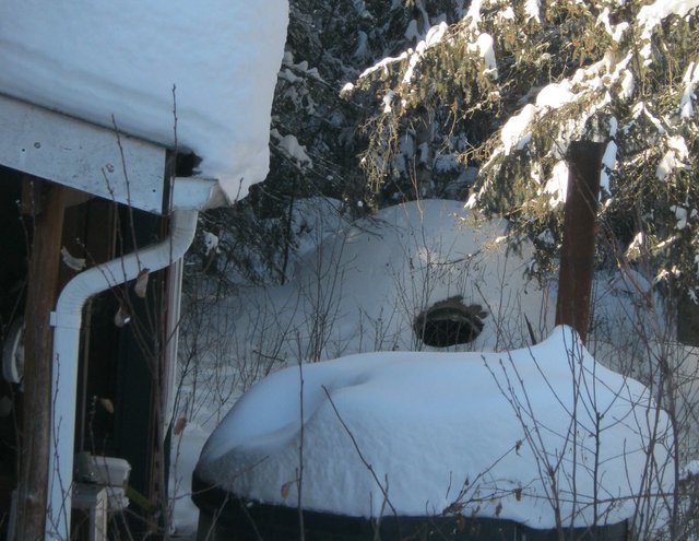 waves of snow roof hot tub and sweat lodge.JPG