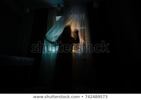 horror-woman-window-wood-hand-450w-742489573.jpg